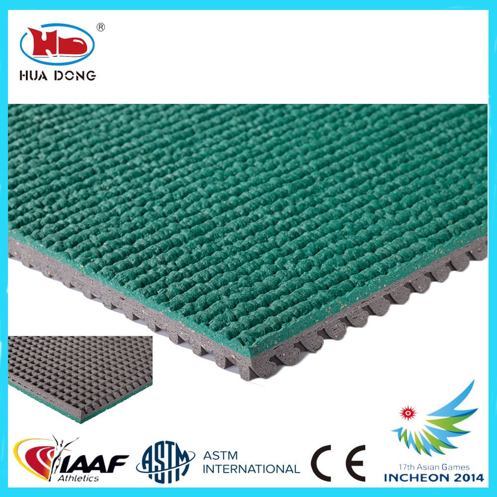 Manufacture of  prefabricated rubber running track surface